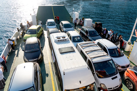 Tivat, Montenegro, 27 April 2025, ferry boat ship for cars sails on the Adriatic Seaのeditorial素材