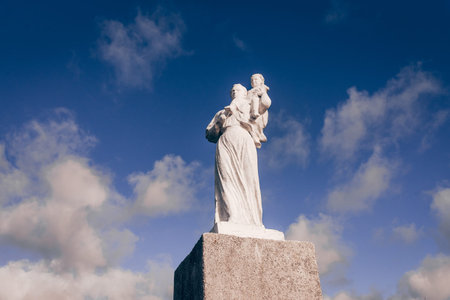 Baltiysk, Russia, 3 February 2020, Marble sculpture monument Sailor's wife woman with childのeditorial素材