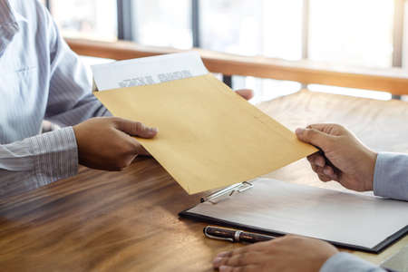 Insurance or loan real estate, Agent broker and client signing contract agreement approved to buy property had passed the examination.の写真素材