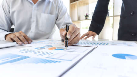 Startup business people group brainstorming on meeting to planning investment project working and strategy of business making conversation with partner, financial and accounting concept.の写真素材