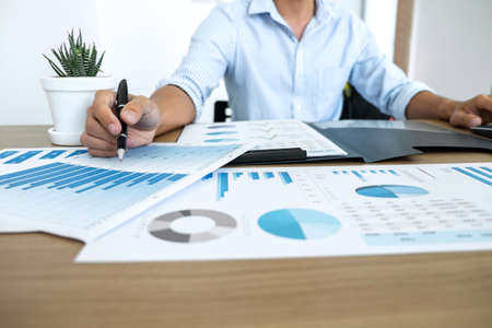 Businessman accountant making working audit and calculating expense financial annual financial...