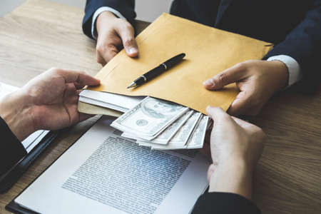 Dishonest cheating in business illegal money, Business man giving bribe money in business people to...