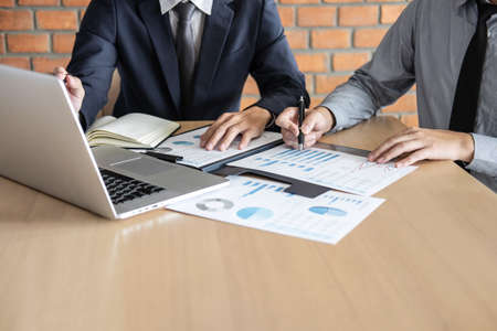 Professional Business partner discussing ideas planning and presentation project at meeting working and analysis at workspace, financial and investment concept, collaborative teamwork analyze data.の写真素材
