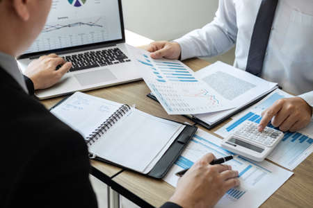 Professional Business colleague team working and analyzing with new project of accounting finance, Idea presentation and meeting strategy plan of financial business investment.の写真素材