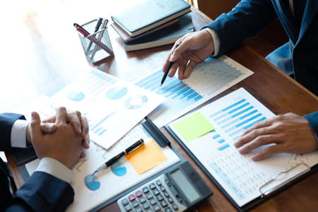 Professional Business partner team discussing on meeting to presentation planning investment project working analyzing and strategy of business making conversation with partner company.の写真素材