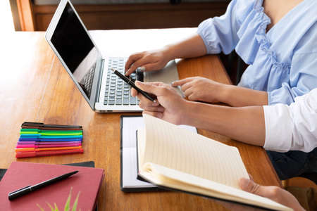 Tutor, learning, education, Group of young people learning studying lesson in library during helping...