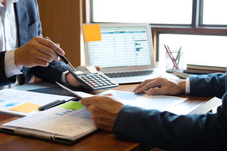 Business people team discuss on meeting to planning investment project working and strategy of business making conversation with partner, financial and accounting concept.の写真素材