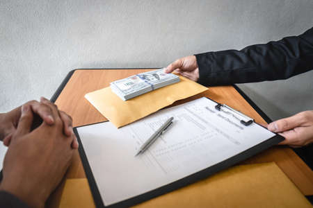 Dishonest cheating in business illegal money, Businessman receive bribe money in envelope to...