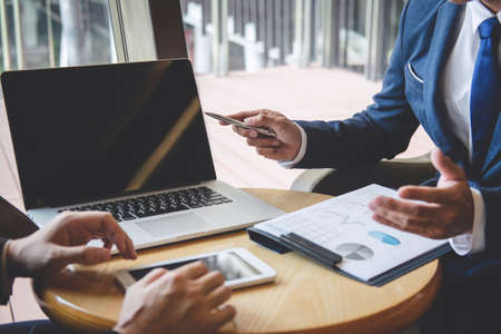Professional Business partner team discussing on meeting to presentation planning investment project working analyzing and strategy of business making conversation with partner company.の写真素材