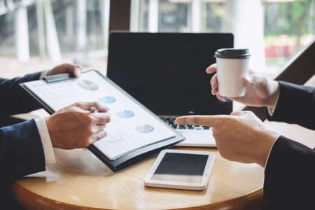 Business people team discuss and analyzing on meeting to planning investment project working and presentation strategy of business making conversation with partner, financial and accounting concept.の写真素材