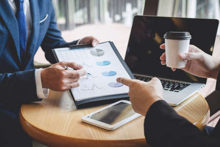 Professional Business partner team discussing on meeting to presentation planning investment project working analyzing and strategy of business making conversation with partner company.の写真素材