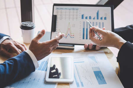 Professional Business partner team discussing on meeting to presentation planning investment project working analyzing and strategy of business making conversation with partner company.の写真素材