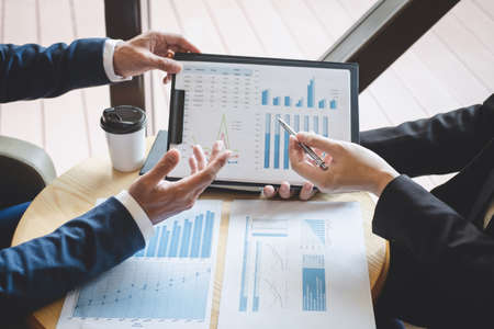 Professional executive manager, Business partner discussing ideas marketing plan and presentation project of investment at meeting and analyzing on document data, financial and investment concept.の写真素材