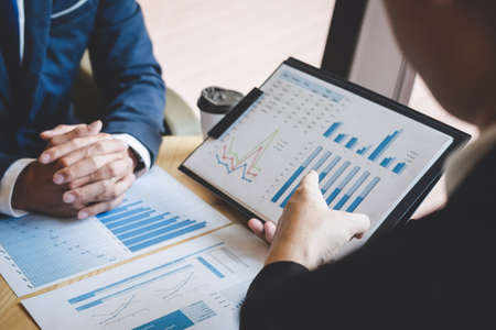Business people team discuss and analyzing on meeting to planning investment project working and presentation strategy of business making conversation with partner, financial and accounting concept.の写真素材