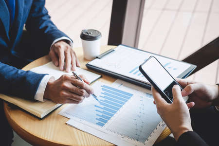 Professional Business partner team discussing on meeting to presentation planning investment project working analyzing and strategy of business making conversation with partner company.の写真素材