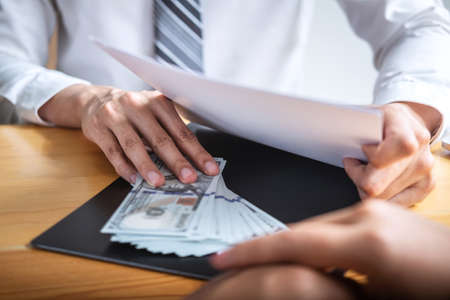 Dishonest cheating in business illegal money, Businessman giving bribe money in business people to...