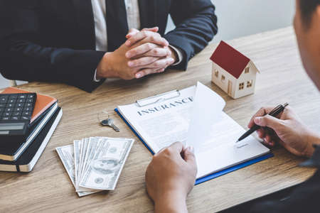 Estate agent broker reach contract form to client signing agreement contract real estate with...