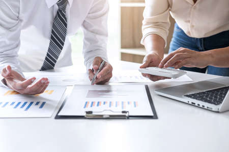 Group of Business leader team conference on meeting presentation to planning investment project working and strategy of business making conversation with partner, financial and accounting concept.の写真素材