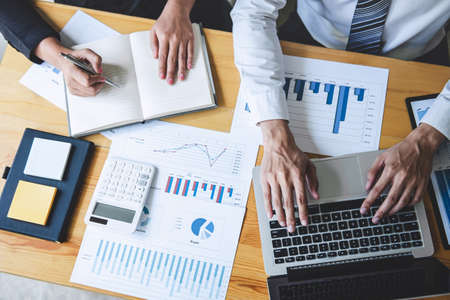 Professional Business partner discussing ideas planning and presentation project at meeting working and analysis at workspace, financial and investment concept, collaborative teamwork analyze data.の写真素材