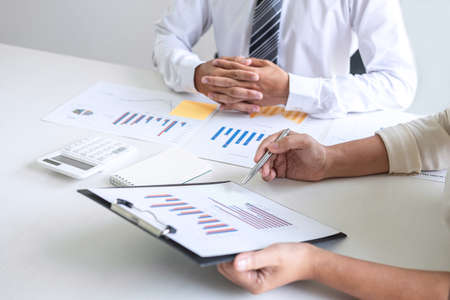 Group of Business leader team conference on meeting presentation to planning investment project working and strategy of business making conversation with partner, financial and accounting concept.の写真素材