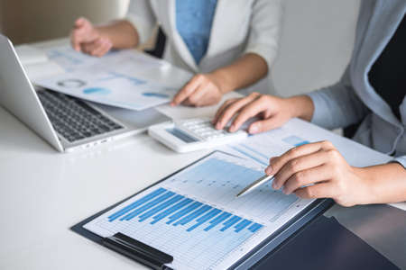 Executive business woman team brainstorming on meeting to conference planning investment project working and strategy of business making conversation with partner, financial and accounting concept.の写真素材