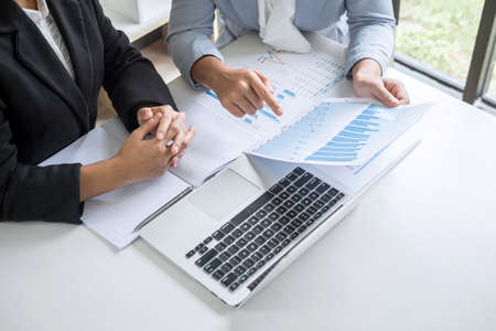 Businesswoman leader team conference on meeting presentation to planning investment project working and strategy of business making conversation with partner, financial and accounting concept.の写真素材