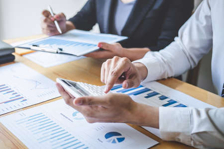 Professional executive Business colleague team working and analyzing with new project of accounting finance, Idea presentation and meeting strategy plan of financial business investment.の写真素材