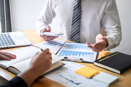 Professional executive Business colleague team working and analyzing with new project of accounting finance, Idea presentation and meeting strategy plan of financial business investment.の写真素材