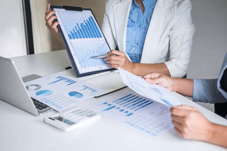 Executive business woman team brainstorming on meeting to conference planning investment project working and strategy of business making conversation with partner, financial and accounting concept.の写真素材