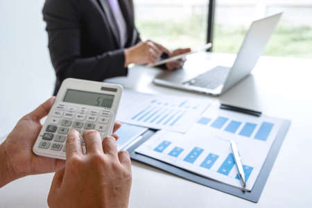 Executive business woman team brainstorming on meeting to conference planning investment project working and strategy of business making conversation with partner, financial and accounting concept.の写真素材