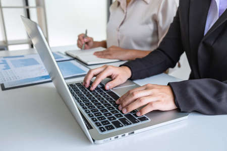 Executive business woman team brainstorming on meeting to conference planning investment project working and strategy of business making conversation with partner, financial and accounting concept.の写真素材