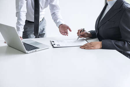 Employer arriving for a job interview, committee listen to candidate answers explaining about his profile and colloquy dream job, manager sitting in job Interview talking in office.の写真素材
