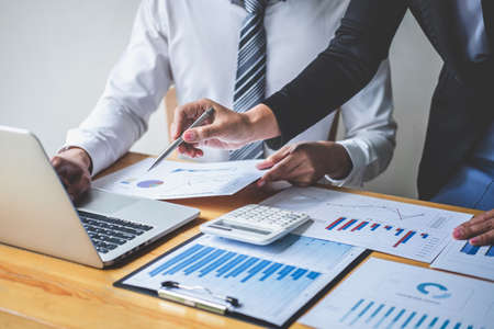 Professional Business partner discussing ideas planning and presentation project at meeting working and analysis at workspace, financial and investment concept, collaborative teamwork analyze data.の写真素材