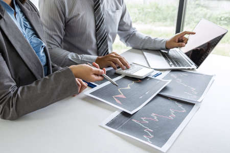 Business team on meeting to planning investment trading project and strategy of deal on a stock exchange with partner, financial and accounting concept, collaborative teamwork analyze data.の写真素材
