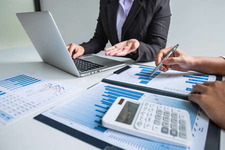 Executive business woman team brainstorming on meeting to conference planning investment project working and strategy of business making conversation with partner, financial and accounting concept.の写真素材