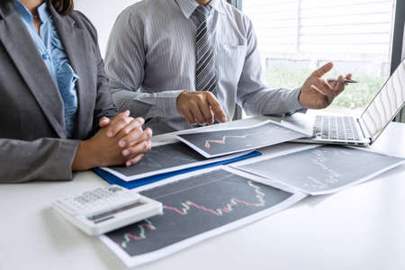 Business team on meeting to planning investment trading project and strategy of deal on a stock exchange with partner, financial and accounting concept, collaborative teamwork analyze data.の写真素材