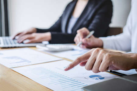 Professional executive Business colleague team working and analyzing with new project of accounting finance, Idea presentation and meeting strategy plan of financial business investment.の写真素材