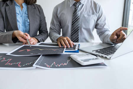 Business team on meeting to planning investment trading project and strategy of deal on a stock exchange with partner, financial and accounting concept, collaborative teamwork analyze data.の写真素材