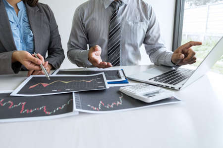 Business team discussion on meeting to planning investment trading project and strategy to investor of deal on a stock exchange with partner, financial and accounting concept, collaborative teamwork.の写真素材