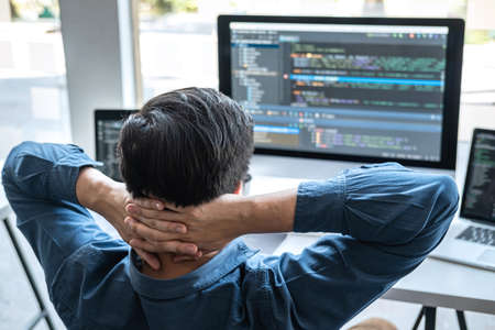 Professional Development programmer working in programming website a software and coding technology, writing codes and data code, Programming with HTML, PHP and javascript.の写真素材