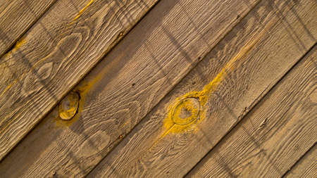 Background, construction, wood surface, old wall made of wooden boards, diagonal textureの写真素材