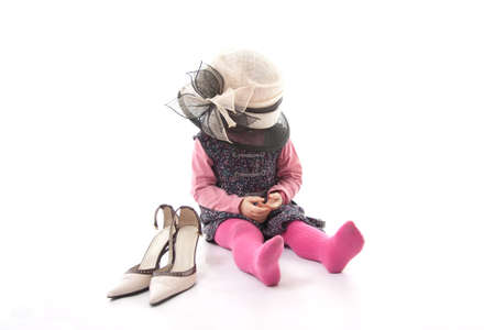 Little girl playing dress upの写真素材