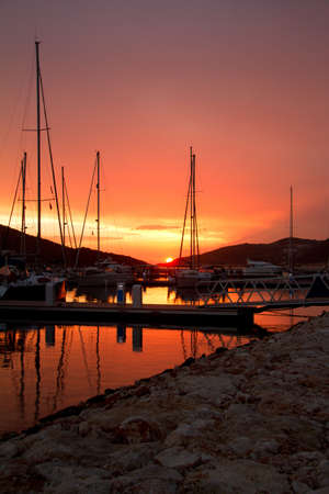 Yachts in a beautiful sunsetの写真素材