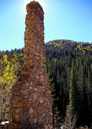 Abandoned chimney in the mountains.の写真素材