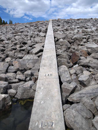Looking up at the top of an empty irrigation reservoir.の写真素材