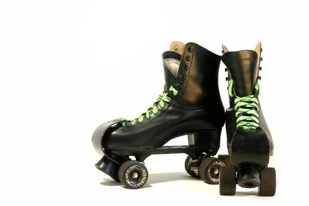 Black rollerskates isolated on whiteの写真素材