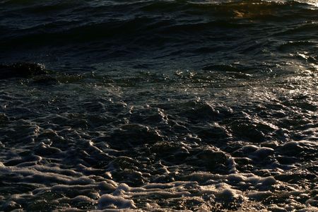 A texture of waves crashing ashore