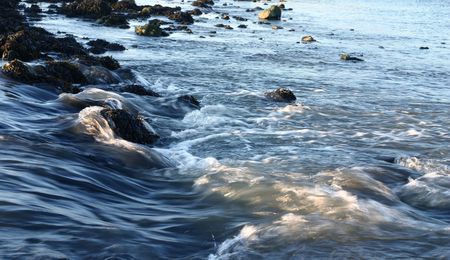 Water in a flowing motionの写真素材