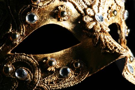 Detail of a richly decorated venetian maskの写真素材