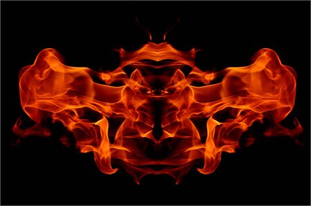 Flames in an abstract mirrored figureの写真素材